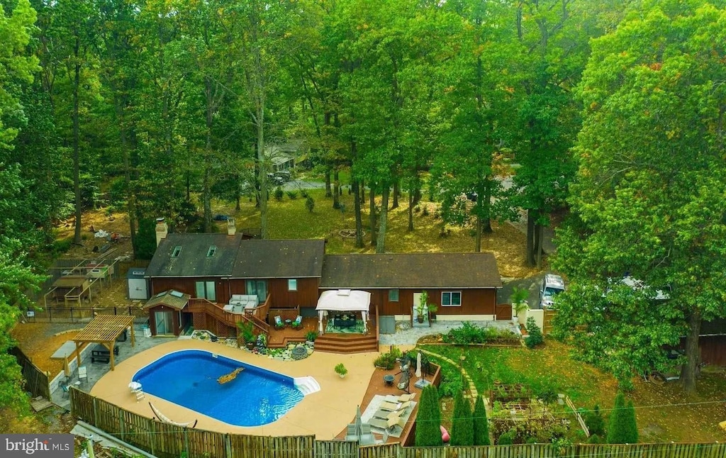 view of pool featuring a patio area