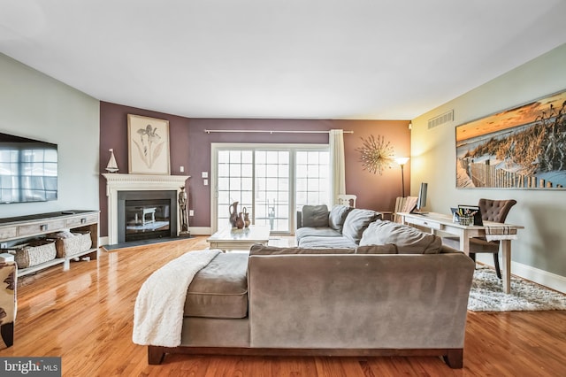 living room with hardwood / wood-style flooring