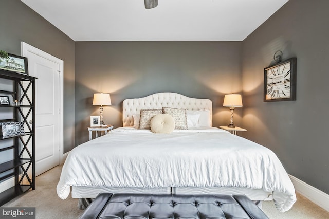 bedroom with light carpet