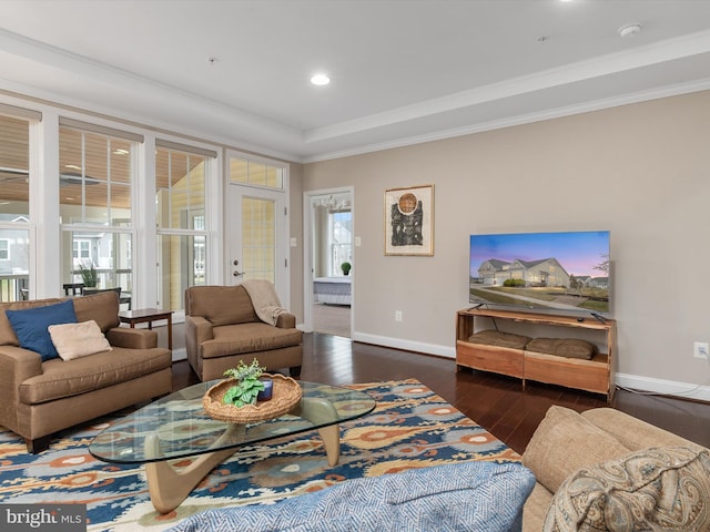 living area featuring hardwood / wood-style flooring, recessed lighting, baseboards, and ornamental molding