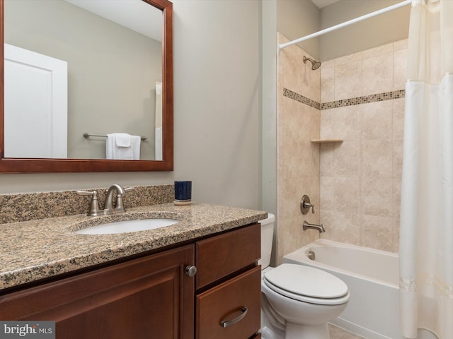 bathroom with toilet, vanity, and shower / tub combo with curtain