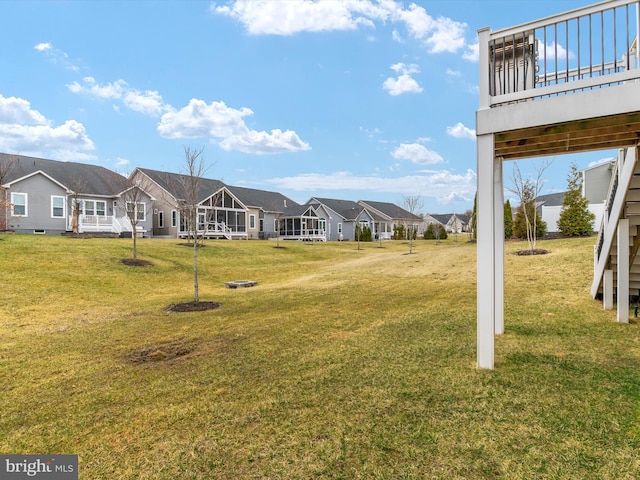 view of yard featuring a residential view