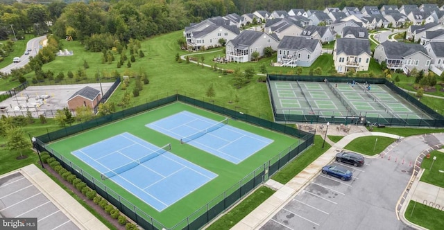 birds eye view of property with a residential view