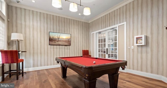 game room with wallpapered walls, baseboards, and ornamental molding