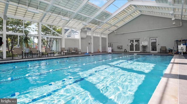 community pool with a lanai and a patio