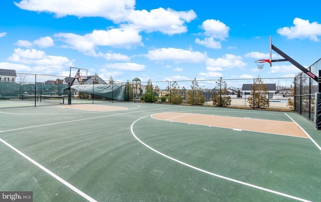 view of sport court with community basketball court and fence