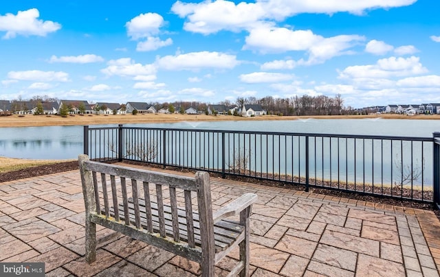 view of patio / terrace featuring a water view