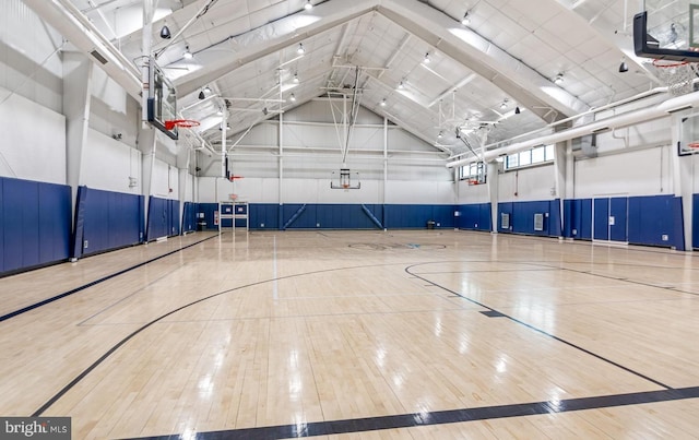 view of sport court featuring community basketball court and fence