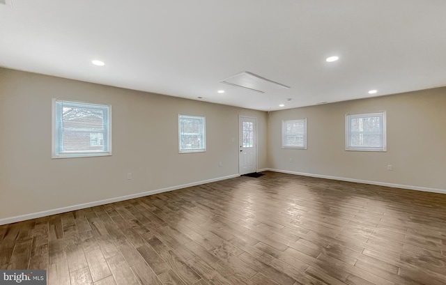 empty room with wood-type flooring