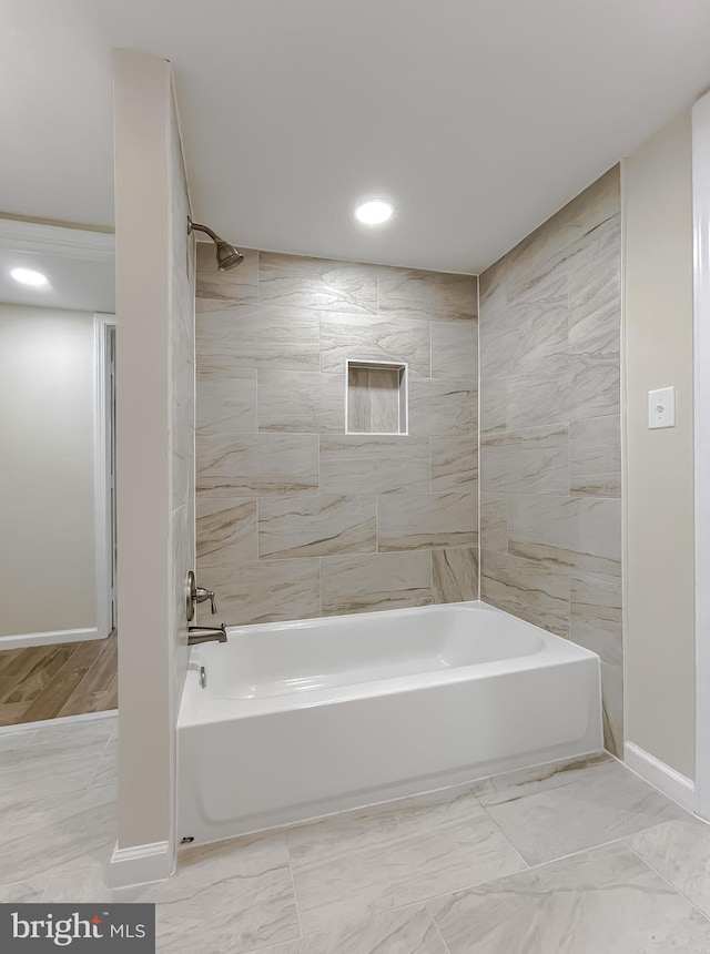 bathroom featuring washtub / shower combination