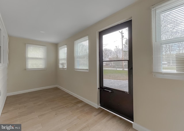 doorway featuring light hardwood / wood-style flooring