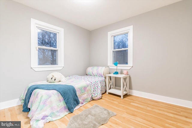 bedroom featuring hardwood / wood-style floors