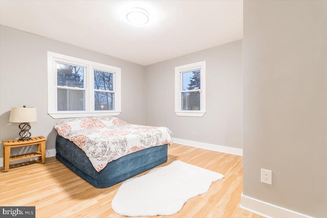 bedroom featuring hardwood / wood-style floors