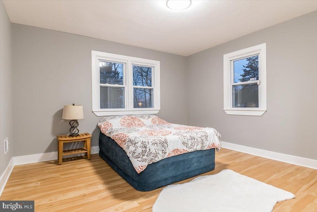 bedroom featuring wood-type flooring