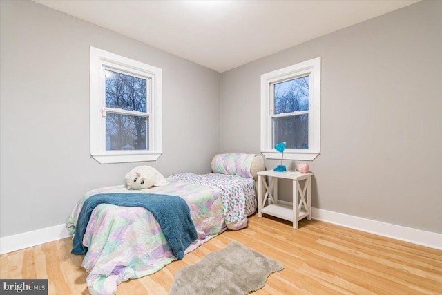 bedroom featuring hardwood / wood-style flooring