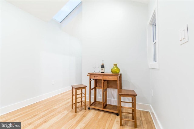 dining room with wood-type flooring