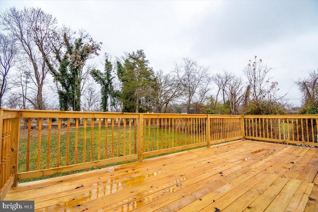 deck featuring a yard