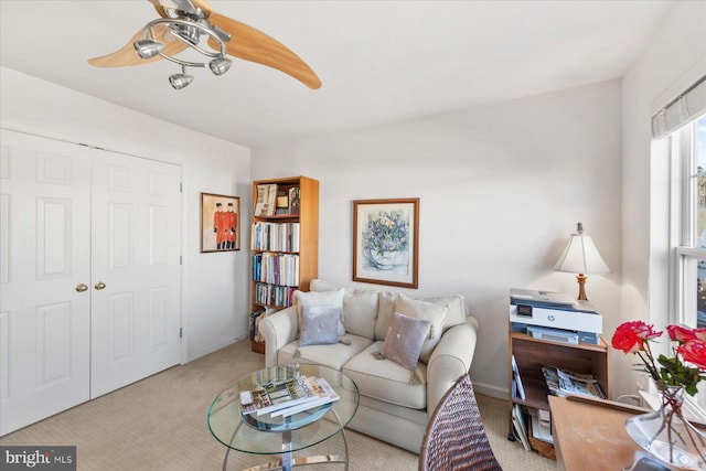 living room with light colored carpet