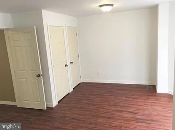 interior space featuring dark hardwood / wood-style floors