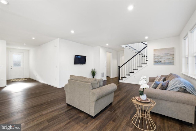 living room with dark wood-type flooring