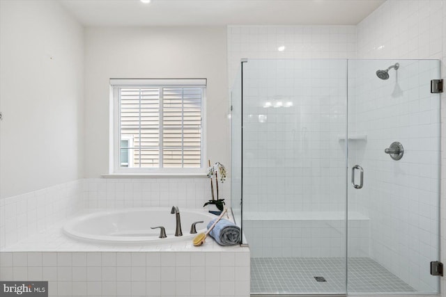 bathroom with independent shower and bath