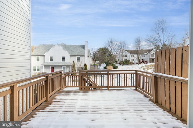 view of snow covered deck