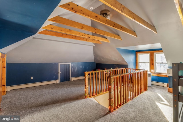 additional living space featuring carpet, baseboard heating, and vaulted ceiling