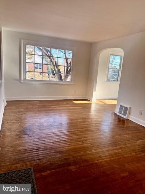 interior space with dark hardwood / wood-style floors