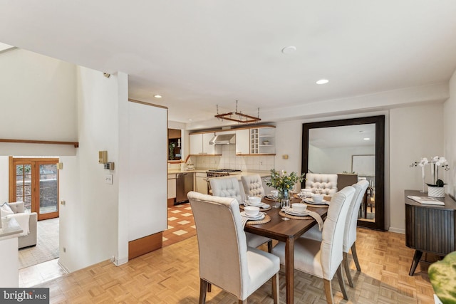 dining room with light parquet floors