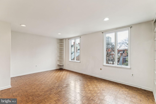 empty room with parquet floors