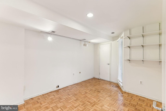 basement with light parquet flooring