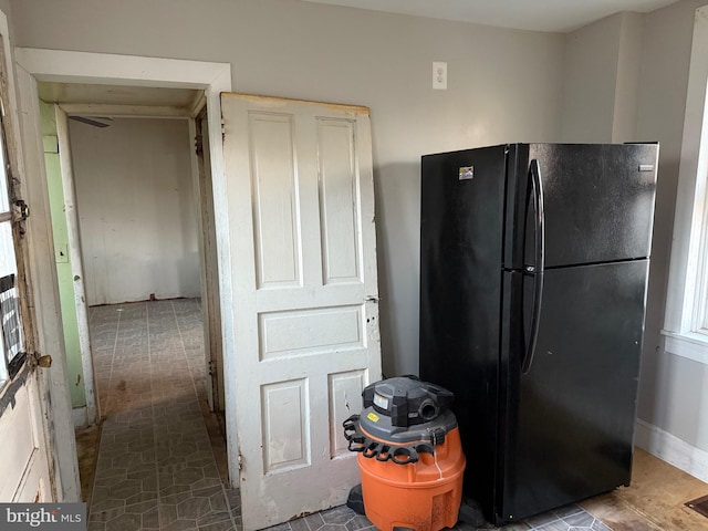 kitchen with black fridge