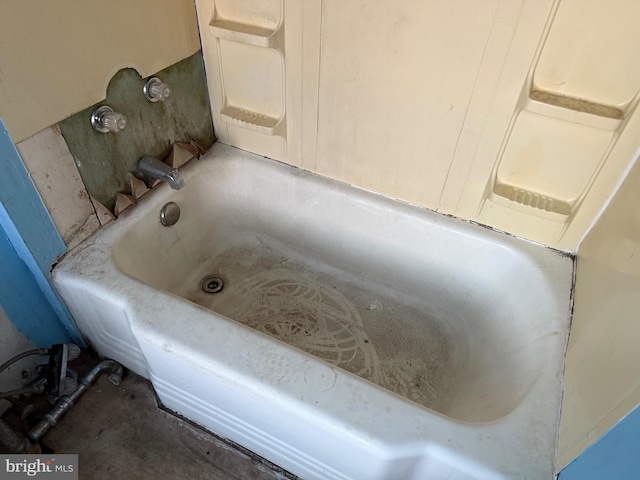 bathroom with a washtub