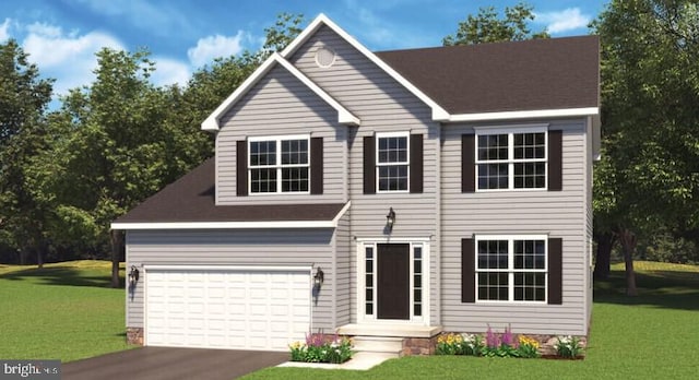 view of front facade with a front yard and a garage