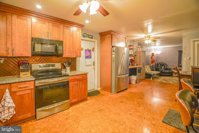 kitchen featuring appliances with stainless steel finishes, tasteful backsplash, and ceiling fan