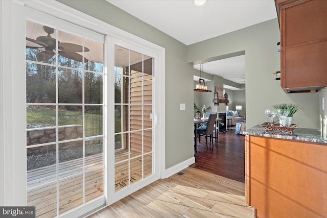 entryway with ceiling fan