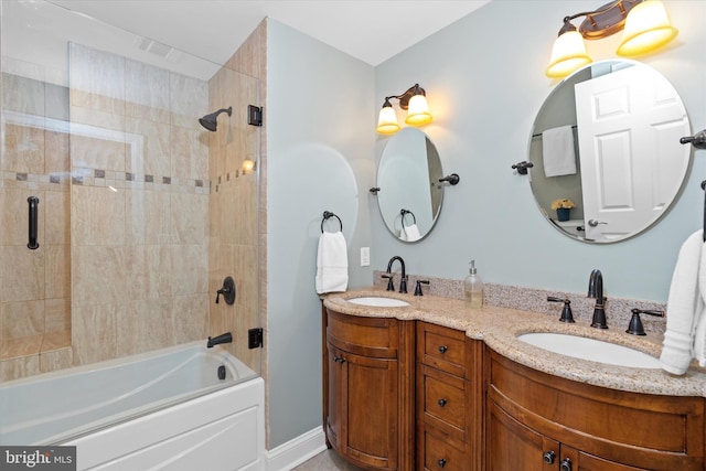 bathroom with vanity and washtub / shower combination