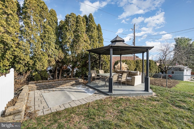 view of yard with a gazebo and an outdoor hangout area