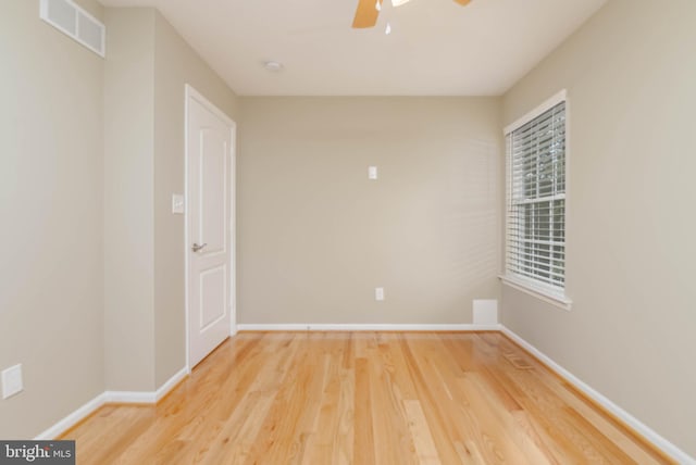 unfurnished room featuring ceiling fan and wood-type flooring