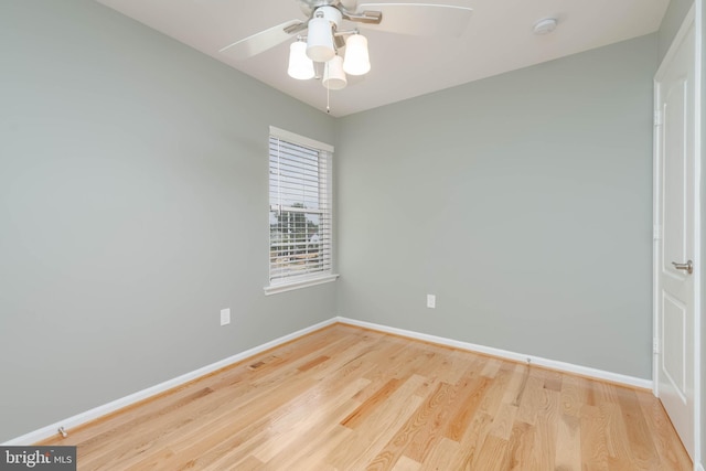 empty room with light wood-type flooring and ceiling fan