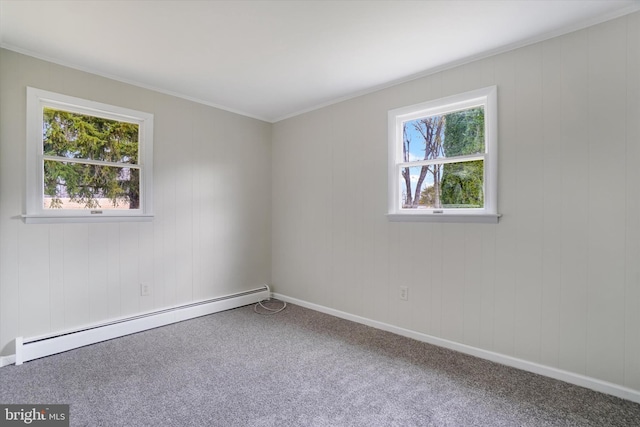 carpeted empty room with a baseboard radiator