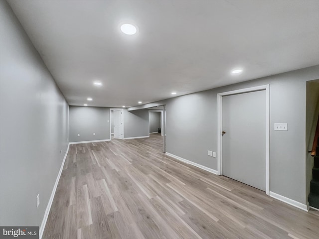 basement featuring light hardwood / wood-style flooring