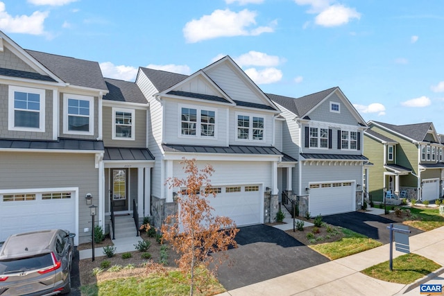 multi unit property featuring a garage