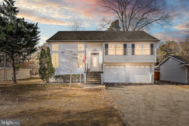 raised ranch with a garage