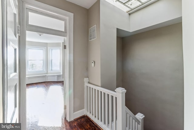 hallway featuring dark hardwood / wood-style floors