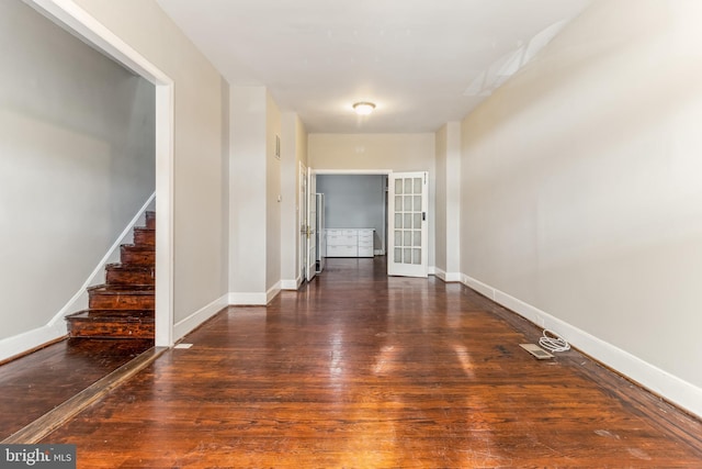 unfurnished room with french doors and dark hardwood / wood-style floors