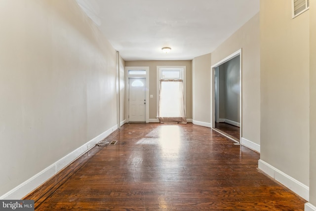 entrance foyer featuring dark hardwood / wood-style floors