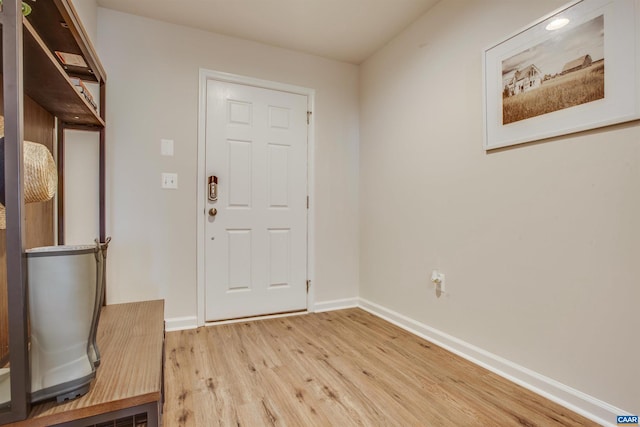 foyer with light hardwood / wood-style floors