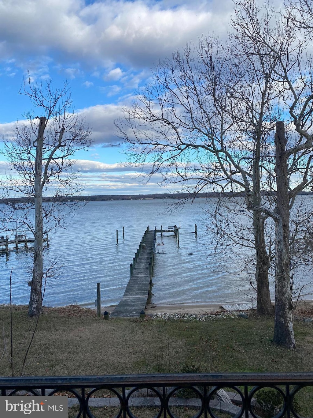 property view of water featuring a dock