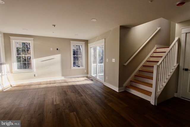 interior space with dark hardwood / wood-style flooring